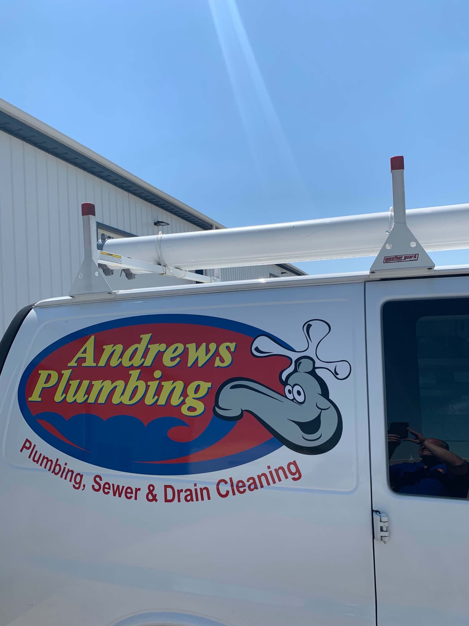 Andrews Plumbing, Sewer & Drain Cleaning service van